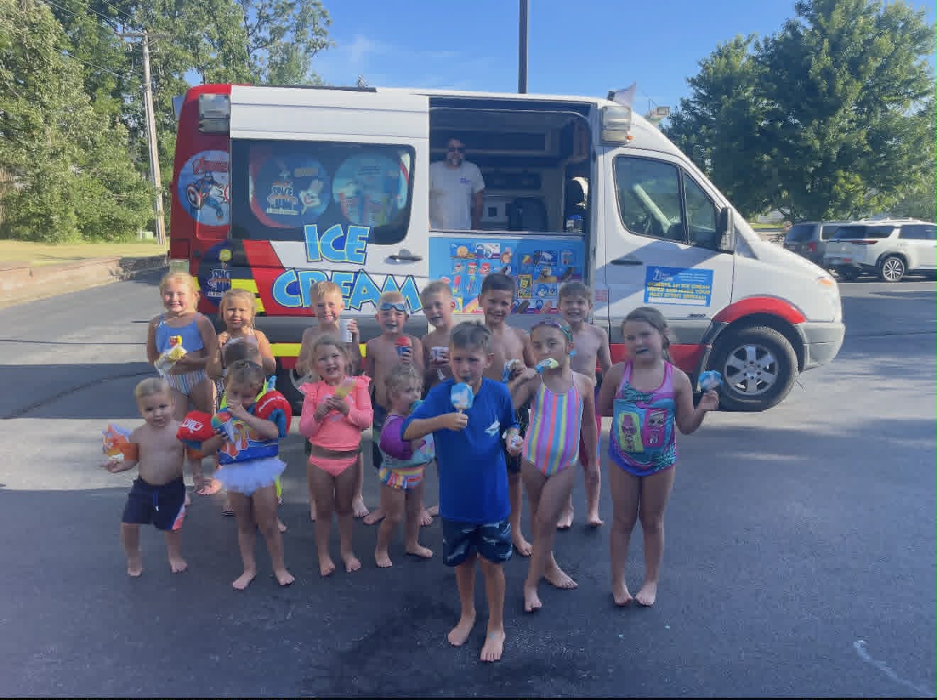Kids at pool party with ice cream truck