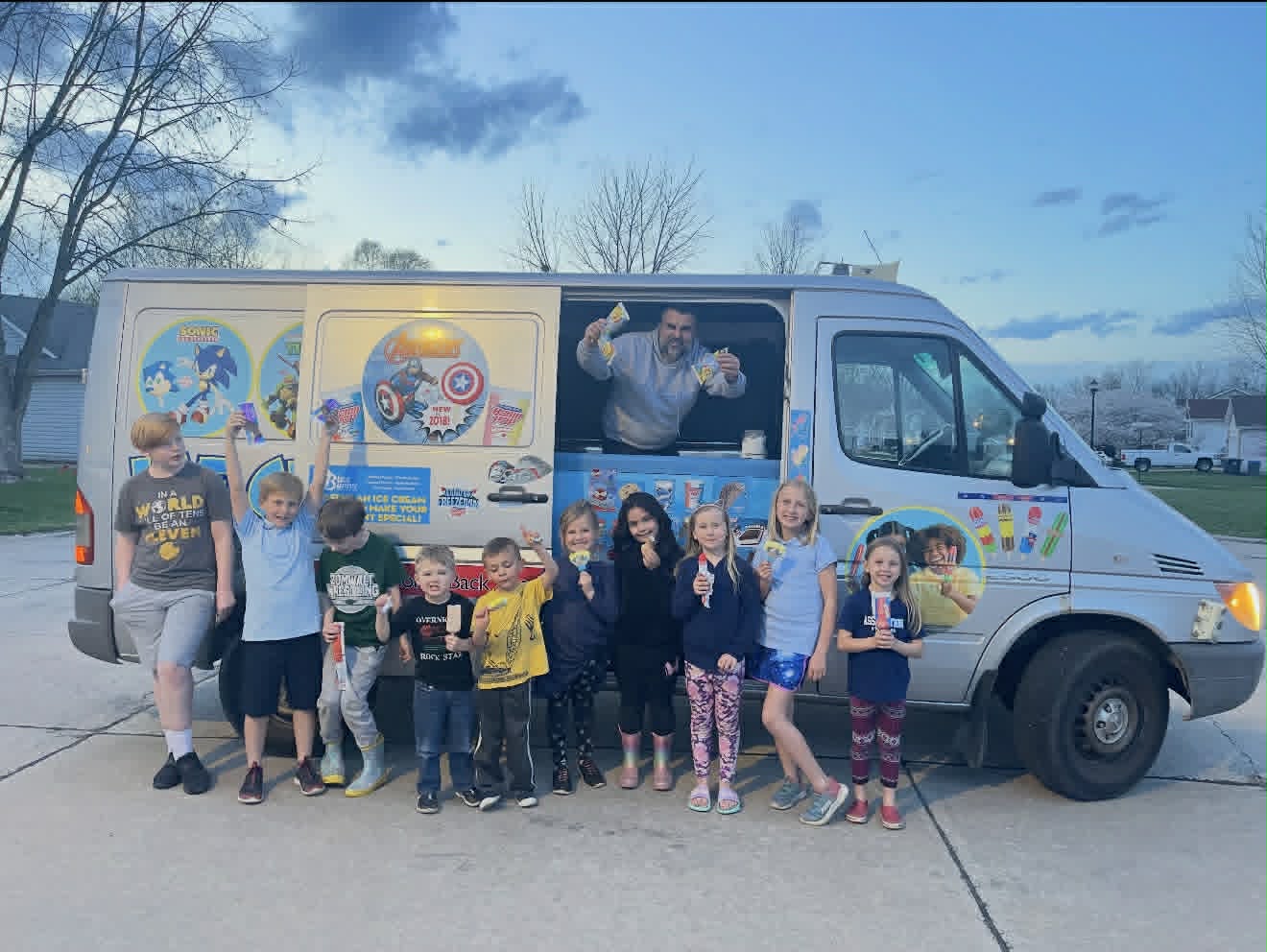 Kids with ice cream at dusk